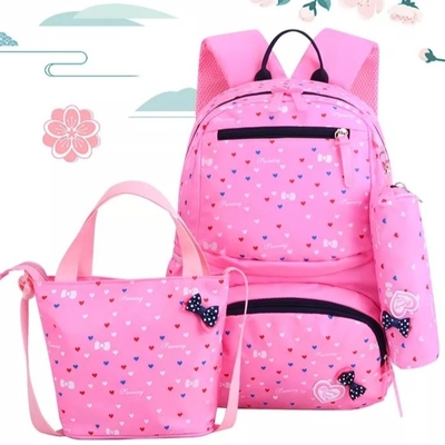 As trouxas para meninas educam crianças bonitos a lancheira isolada que Bookbags da trouxa ajustou o saco