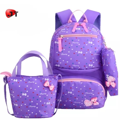 As trouxas para meninas educam crianças bonitos a lancheira isolada que Bookbags da trouxa ajustou o saco
